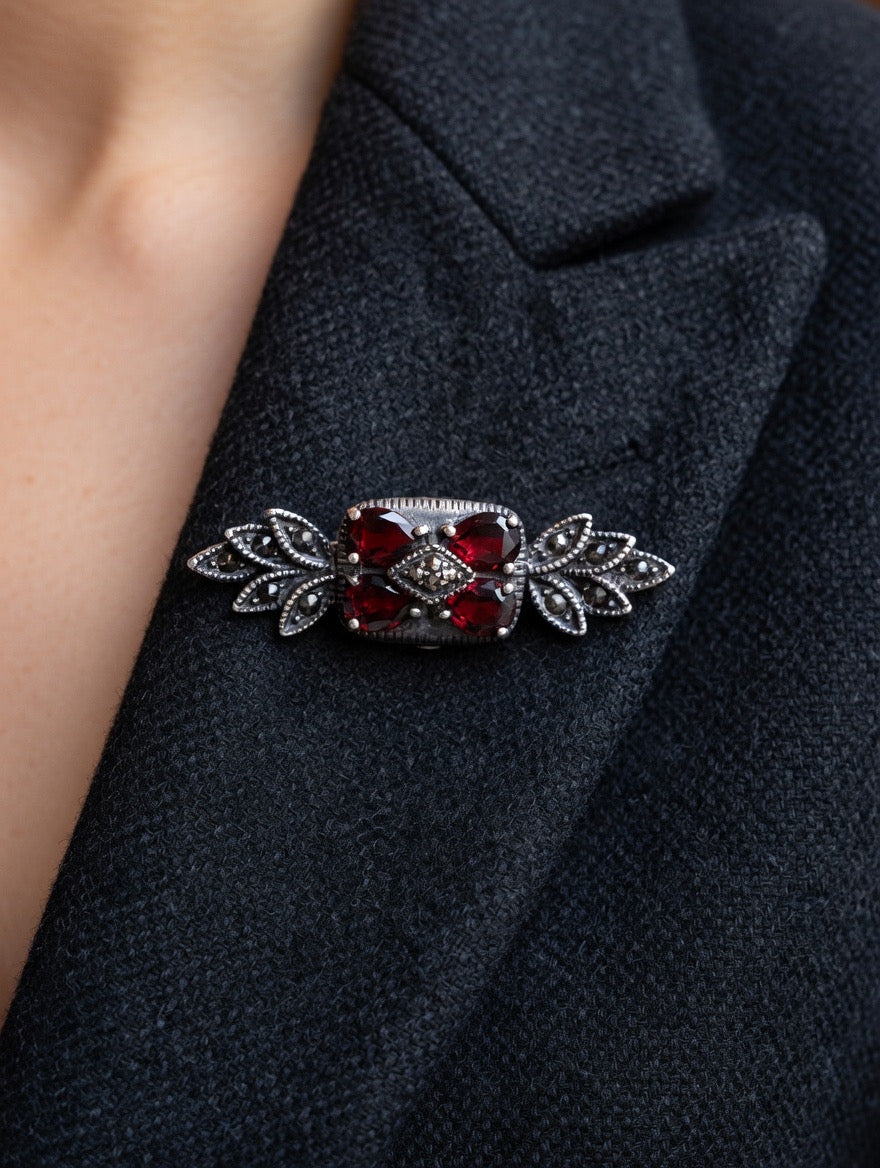 Antique garnet silver brooch